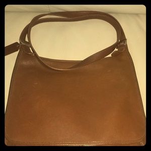 Vintage leather cross body by Coach.